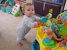 Standing by the saucer.