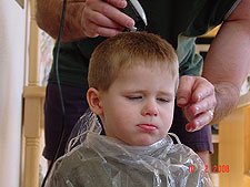 Hunter getting a haircut.