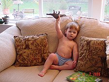 Hunter shows off his dinosaur.