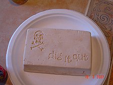 Block of sand containing skeleton bones.