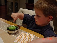 Hunter coloring his eggs