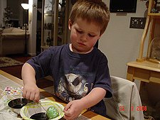 Hunter coloring his eggs