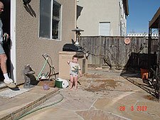 Hunter throwing water balloons