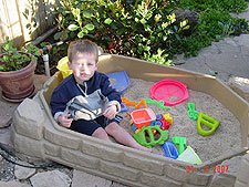 Hunter in his sand box
