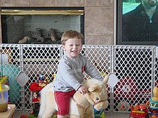 Hunter on his rocking horse.