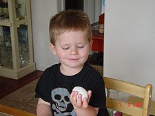 Hunter ready to color eggs.