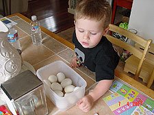Coloring Easter eggs.