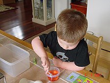 Coloring Easter eggs.
