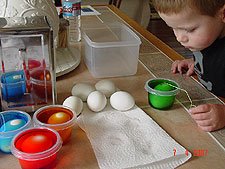 Coloring Easter eggs.