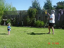 Hunter and Dave blowing bubbles.