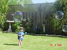 Hunter blowing bubbles.