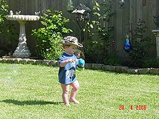 Hunter blowing bubbles.