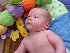 Hunter on his butterfly mat.