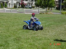Hunter riding his ATV.