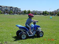 Hunter riding his ATV.
