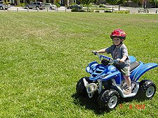 Hunter riding his ATV.