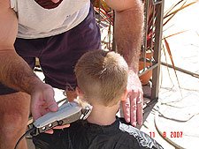 Hunter getting a haircut.