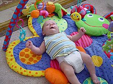 Playing on his mat again...