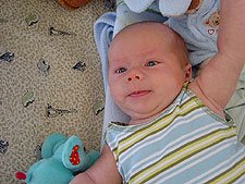 Showing off his new tank top.