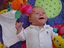 Playing on his favorite mat again...