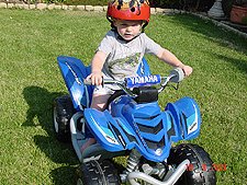 Hunter riding his ATV.