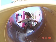 Hunter ready to go down the slide.