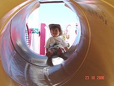 Hunter ready to go down the slide.