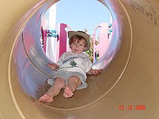 Hunter going down the slide.
