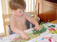 Hunter finger painting.