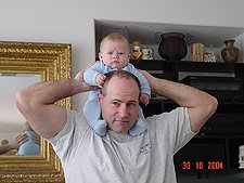 Hunter on daddy's shoulders.