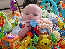 Hunter chewing on his toys.