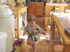 Hunter running around in his big lizard shirt.