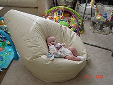 Hunter tries out the bean bag.
