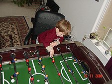 Hunter playing foosball.
