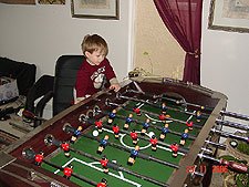 Hunter playing foosball.