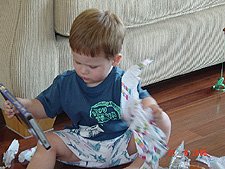 Hunter opening a present
