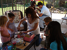 Eating birthday cake.