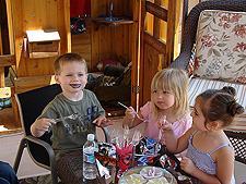 Eating birthday cake.