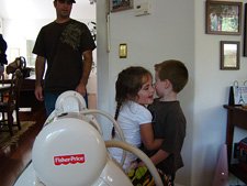 Olivia gives Hunter a hug goodbye.