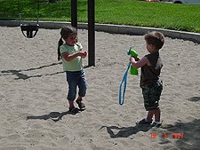 Hunter helping Olivia stay cool!