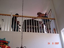 Guys playing foosball