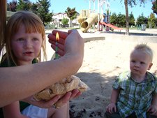 Jessica lights Heidi's birthday cookies!