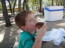Hunter having a donut.
