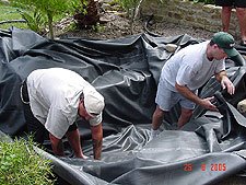 Getting the liner into place.