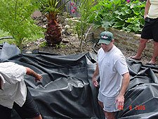 Getting the liner into place.