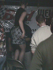 Dancing on the chair.