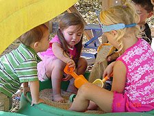 Olivia & friends in the sandbox.