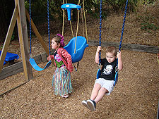Olivia and Hunter swinging