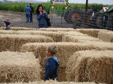 Natalie taking a picture of Austin in the maze.