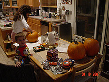 Heidi carving pumpkins